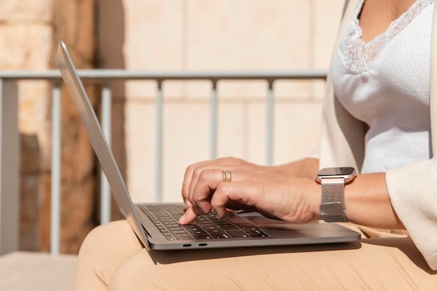 A close-up image of a Spanish entrepreneur's hands typing on a laptop, with a focused expression, signifying hard work, perseverance, and the ability to overcome challenges in the entrepreneurial journey.