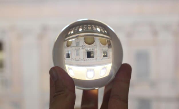 A close-up of a patent application being reviewed, with a magnifying glass over it, showcasing the details of the innovation.