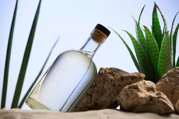 A close-up shot of a bottle of José Cuervo tequila with a stylish label, placed on a rustic wooden table with agave plants in the background. The lighting emphasizes the golden color of the tequila.
