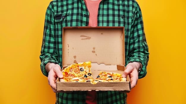 A close-up shot of a Domino's Pizza box being opened, revealing a delicious pizza with melted cheese and various toppings. The scene emphasizes the brand's image and appeal to consumers.