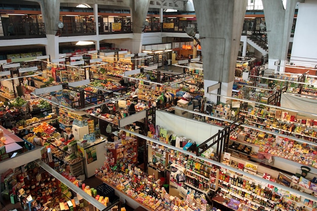 A panorama of the interior of a Liverpool department store, showcasing the variety of products, well-organized displays, and the overall shopping environment.