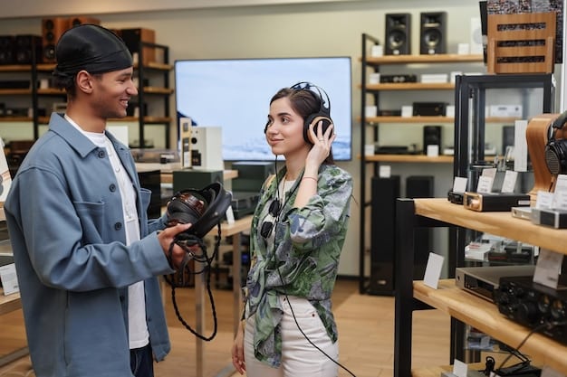 An América Móvil customer service representative assisting a customer at a modern and well-lit store.